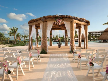 Ceremony decor on pool gazebo at Secrets Maroma Beach Riviera Maya