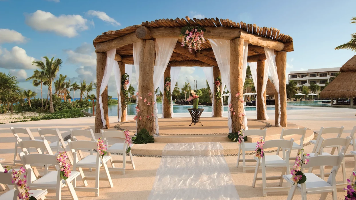 Ceremony decor on pool gazebo at Secrets Maroma Beach Riviera Maya