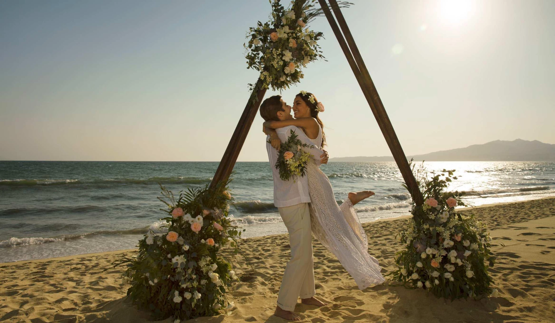 Couple on the beach wedding venue at Secrets Playa Mujeres Golf and Spa