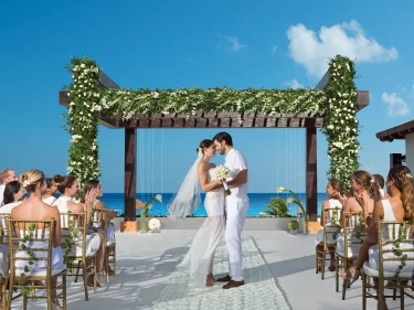 Couple at Secrets Playa Mujeres Golf & Spa Resort Wedding gazebo venue