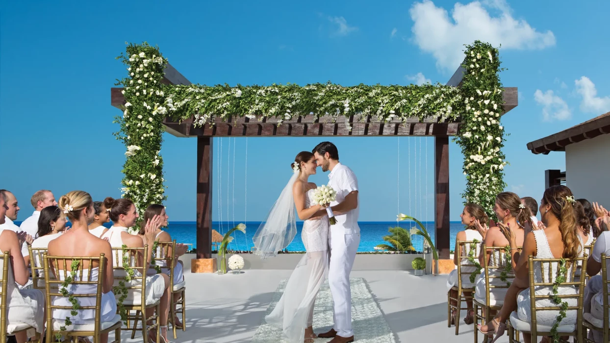 Couple at Secrets Playa Mujeres Golf & Spa Resort Wedding gazebo venue