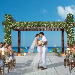 Couple at Secrets Playa Mujeres Golf & Spa Resort Wedding gazebo venue