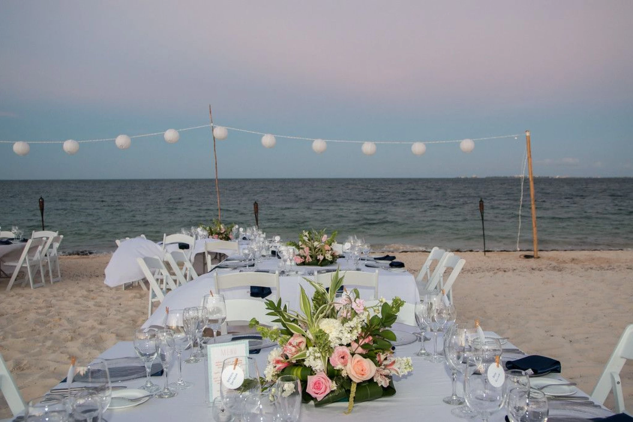 Reception on the beach wedding venue at Secrets Playa Mujeres Golf and Spa