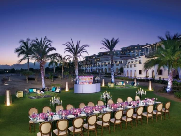 Dinner reception on the west garden at Secrets Puerto Los Cabos Golf & Spa Resort