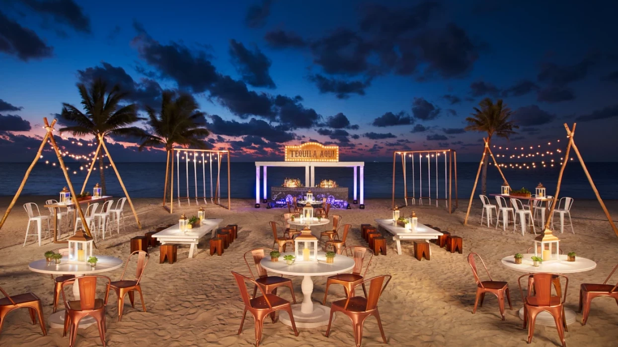 Cocktail party on the beach wedding venue at Secrets Riviera Cancun