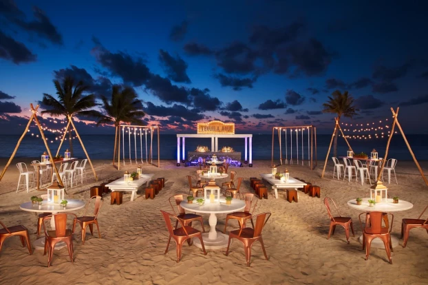 Cocktail party on the beach wedding venue at Secrets Riviera Cancun