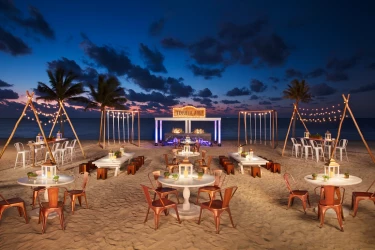 Cocktail party on the beach wedding venue at Secrets Riviera Cancun