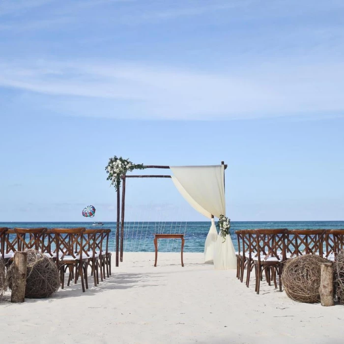 Ceremony decor on the beach at Secrets Royal Beach Punta Cana