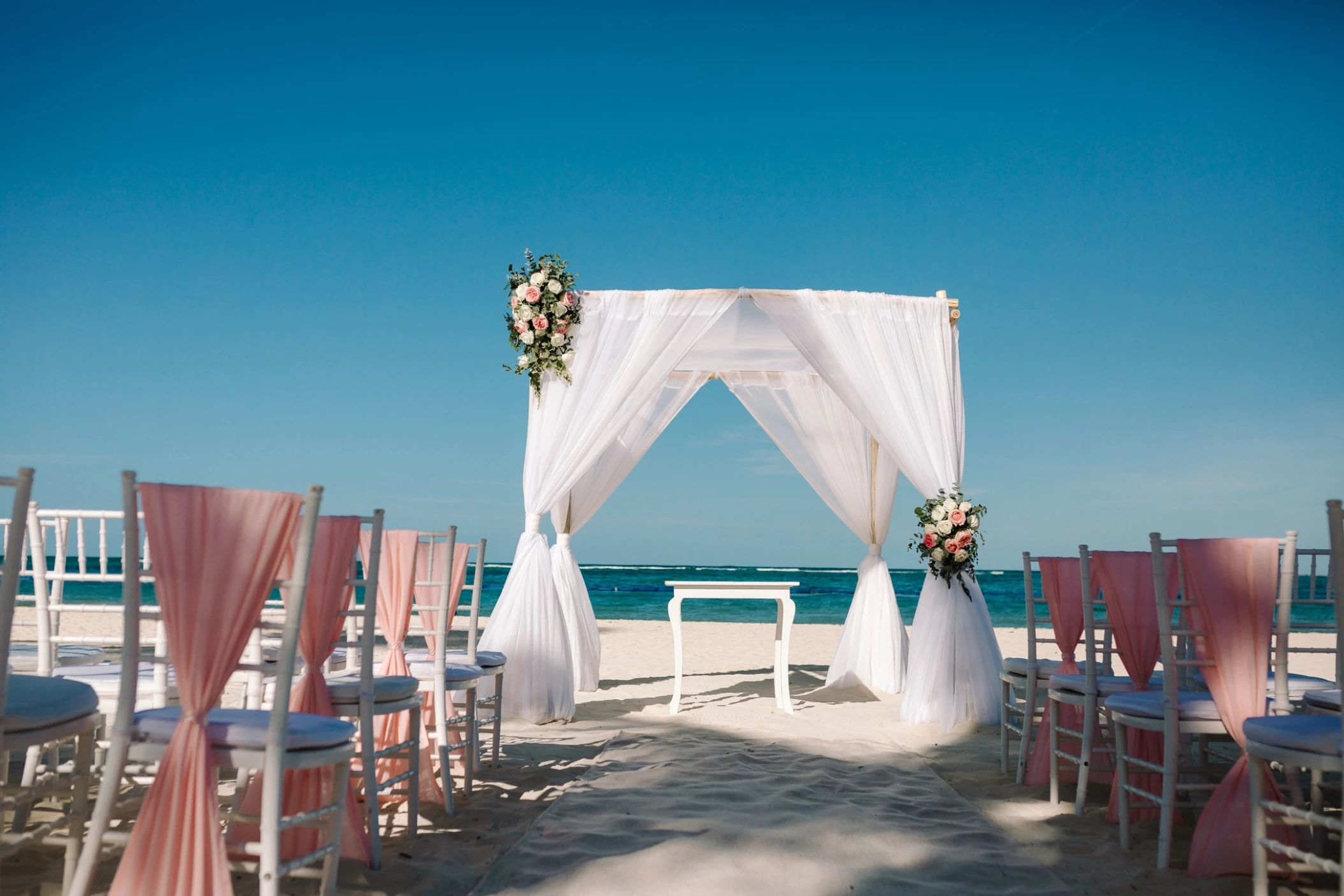 Ceremony decor in the beach at Secrets Royal Beach Punta Cana