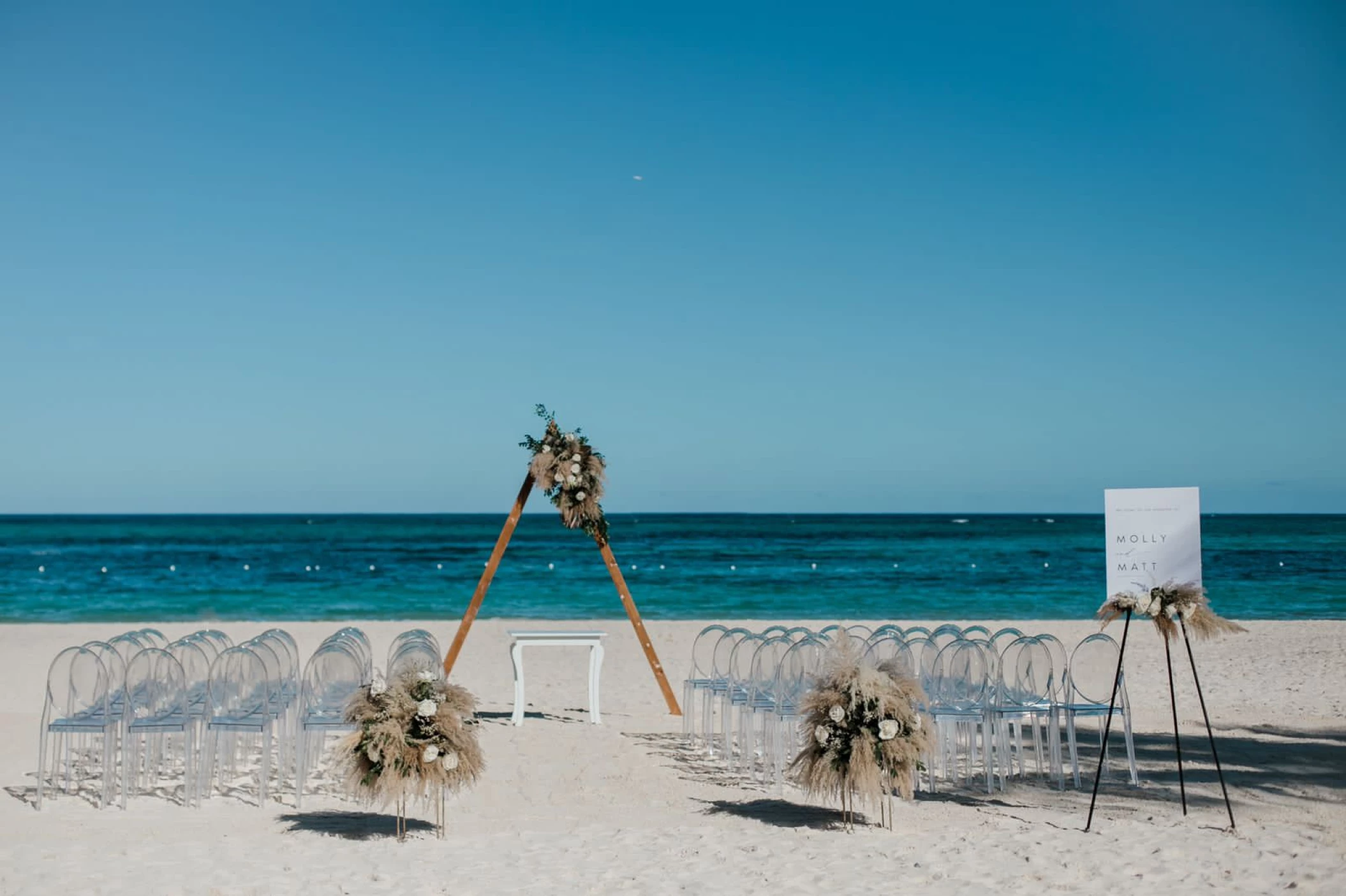 Ceremony decor in the beach at Secrets Royal Beach Punta Cana