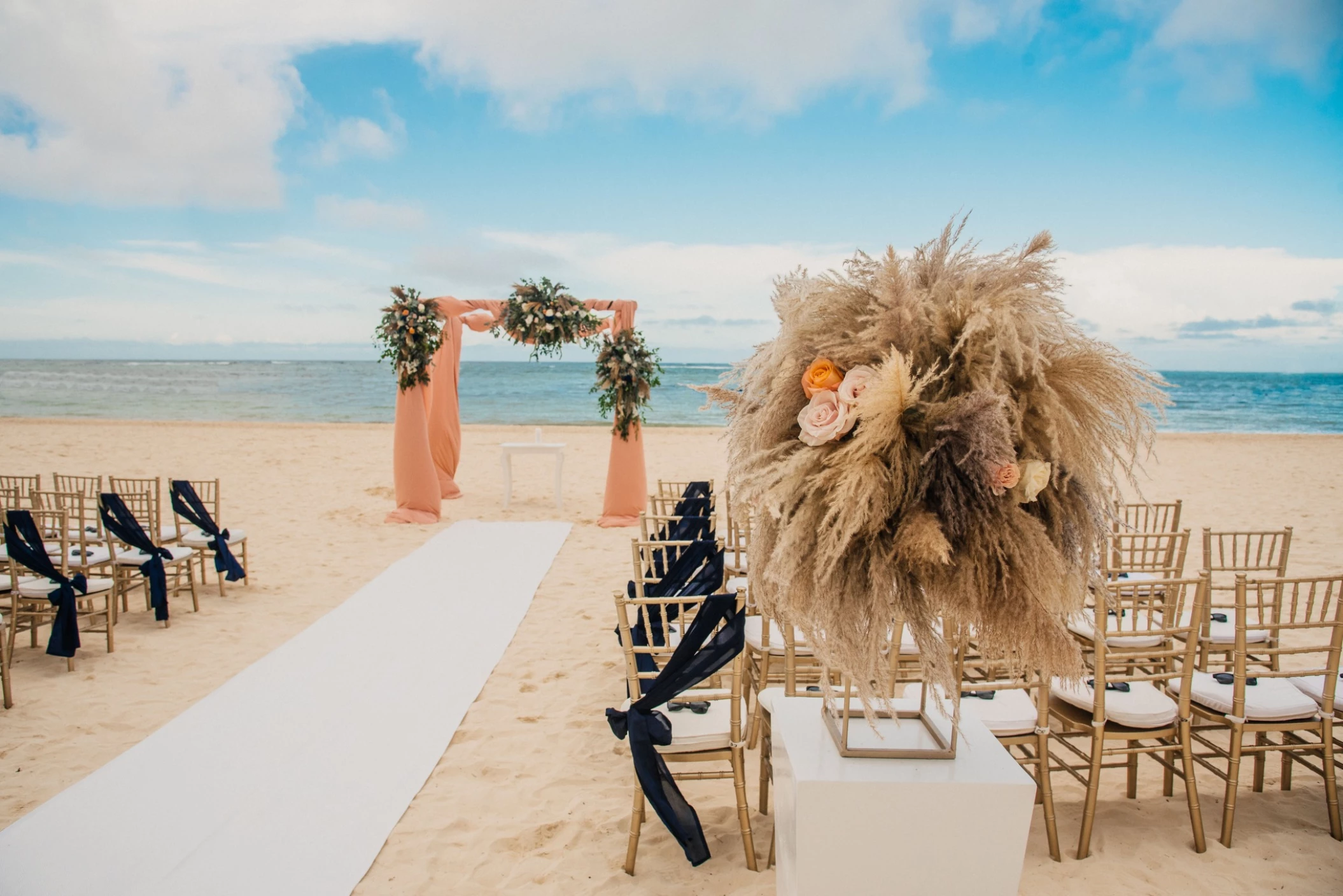 Ceremony decor in the beach at Secrets Royal Beach Punta Cana