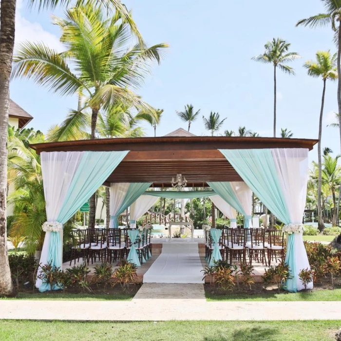 Ceremony in the tropical garden at Secrets Royal Beach Punta Cana