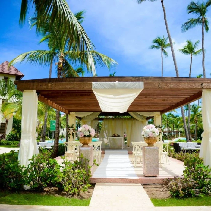 Ceremony decor in the tropical garden at Secrets Royal Beach Punta Cana