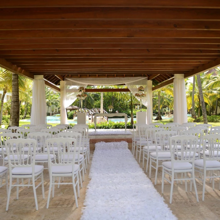 Ceremony decor on the tropical garden at Secrets Royal Beach Punta Cana