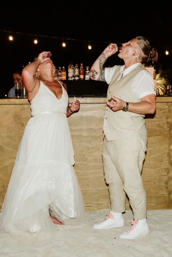 Jennifer & Chelsey at the open bar at their reception