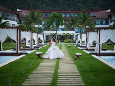 Bride in the middle of Sublime Samana Las Terrenas Resort