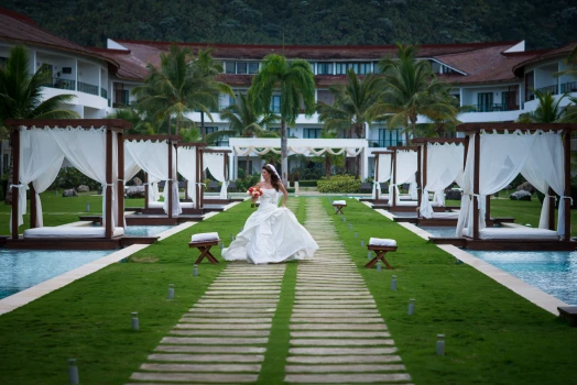 Bride in the middle of Sublime Samana Las Terrenas Resort