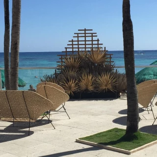 Ceremony decor on sharkys terrace wedding venue at Sunscape Akumal Beach Resort