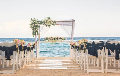 Ceremony decor on beach wedding venue at Sunscape Akumal Beach Resort