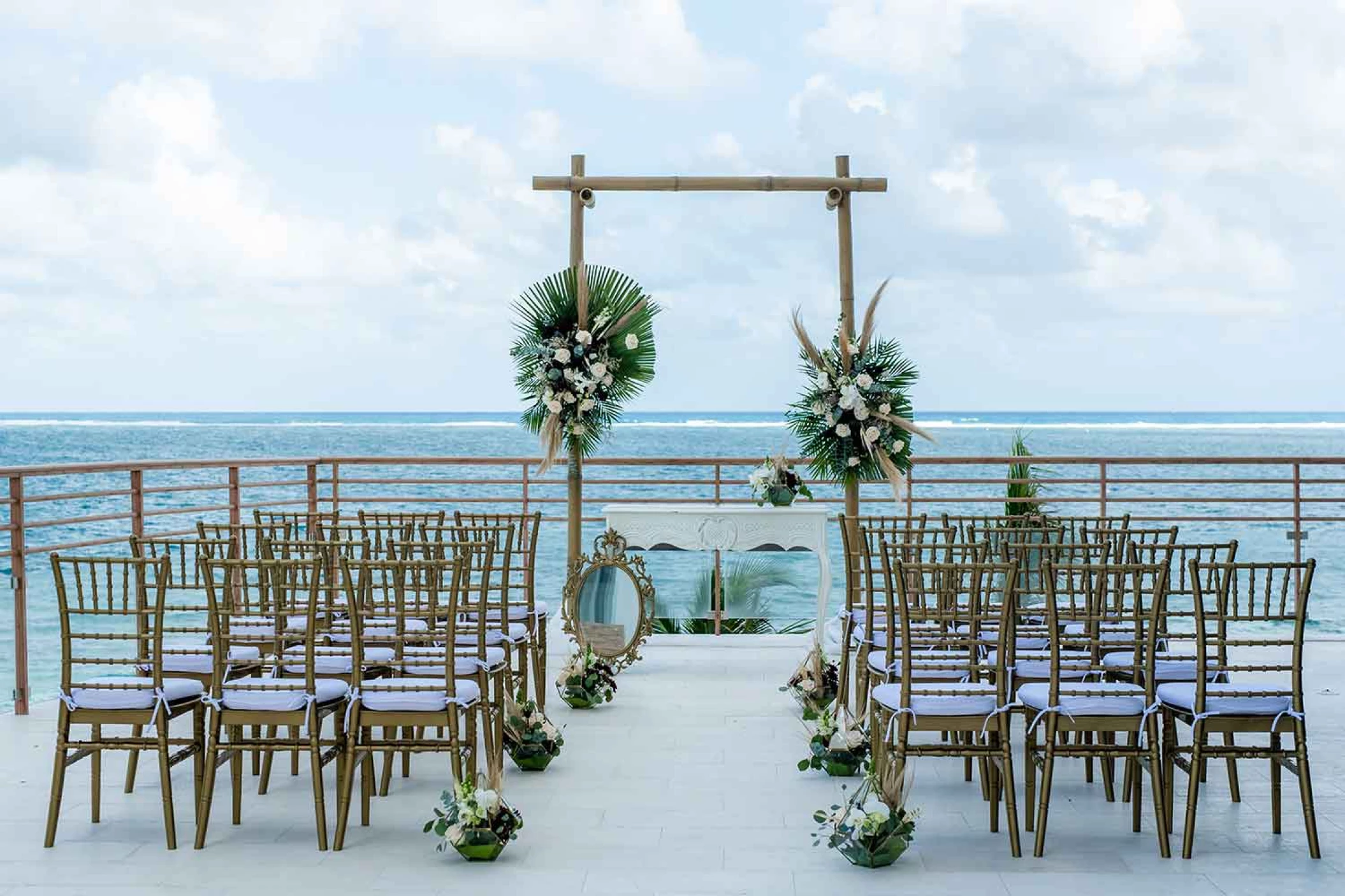 Ceremony decor on al mare terrace at the fives oceanfront puerto morelos