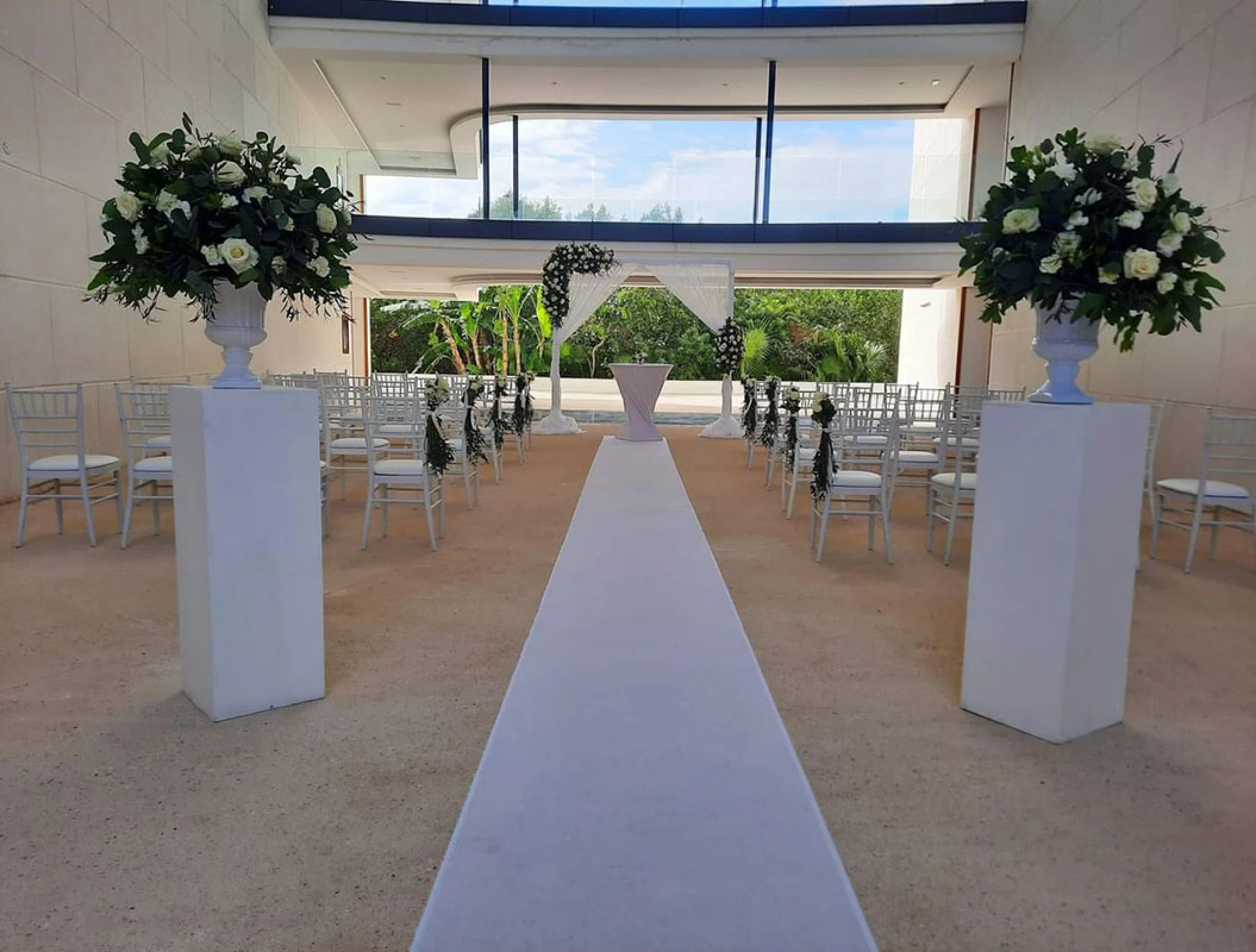Ceremony setup on The H Arch venue at Haven Riviera Cancun Resort.