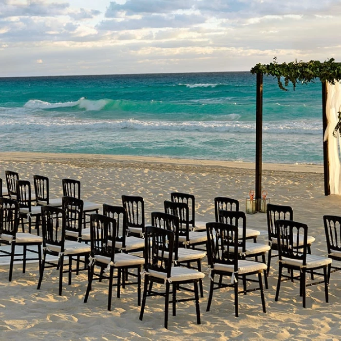 Ceremony decor on beach wedding venue at Unico 20°87° Hotel Riviera Maya