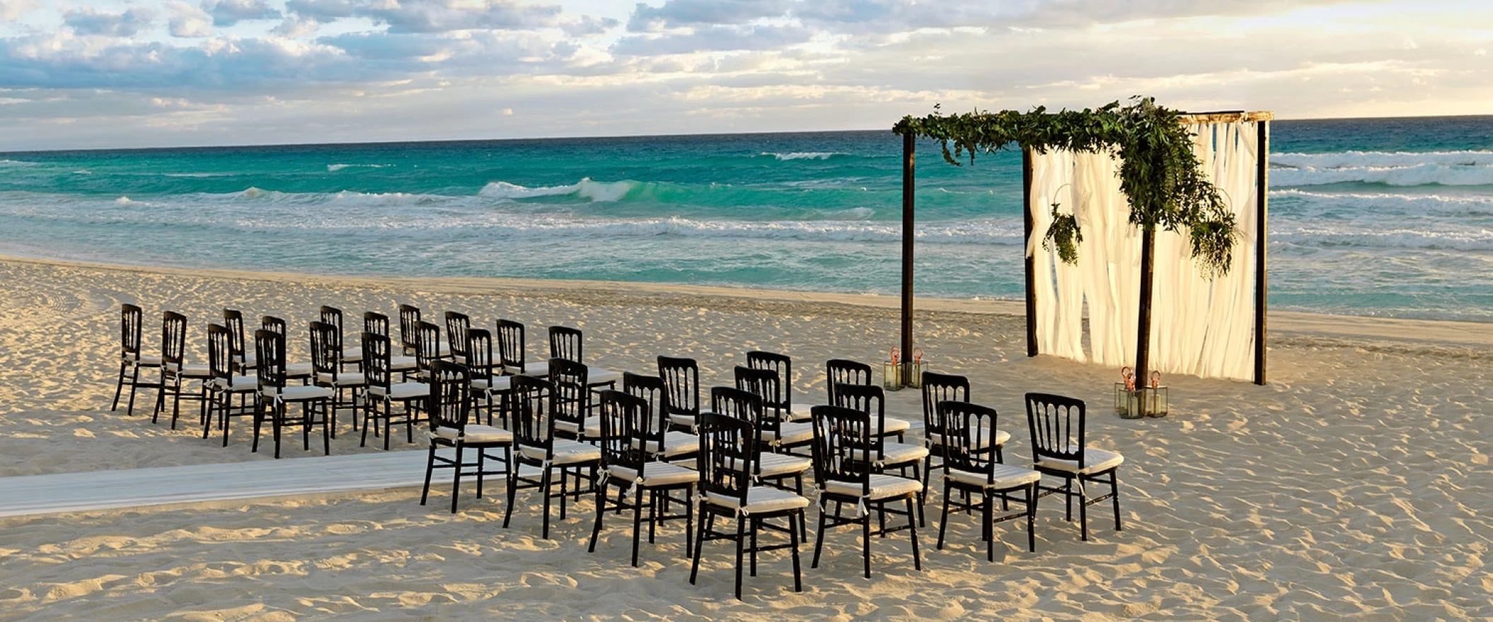 Ceremony decor on beach wedding venue at Unico 20°87° Hotel Riviera Maya