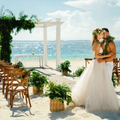 TRS Coral hotel beach wedding ceremony with couple