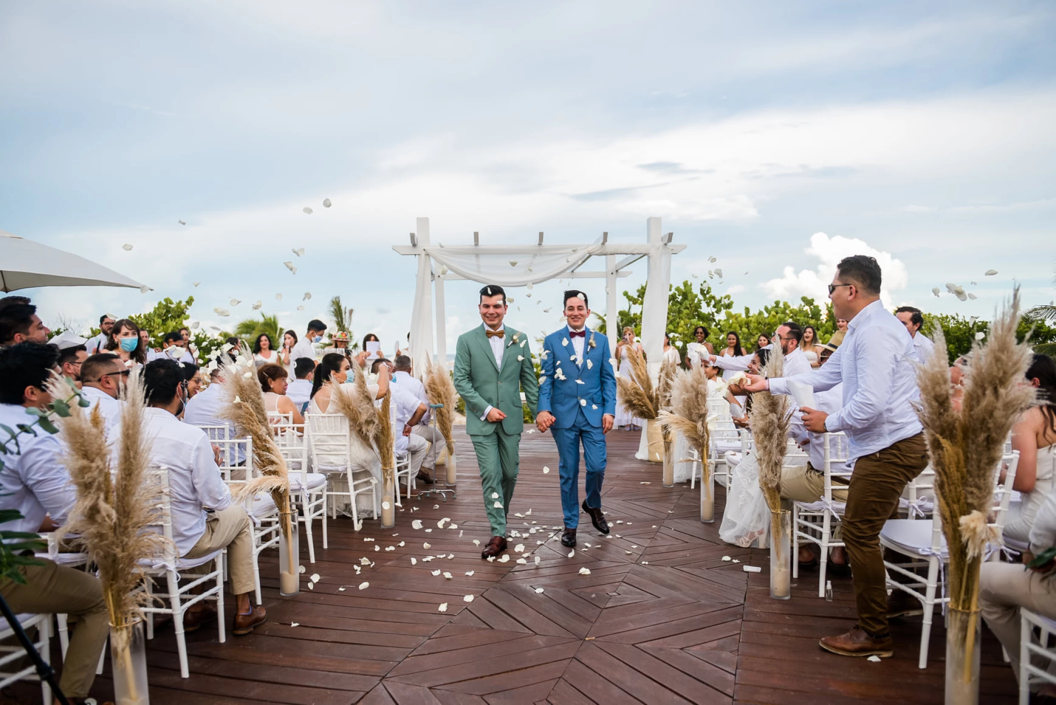 Ceremony decor on the beach deck at Grand Palladium Costa Mujeres