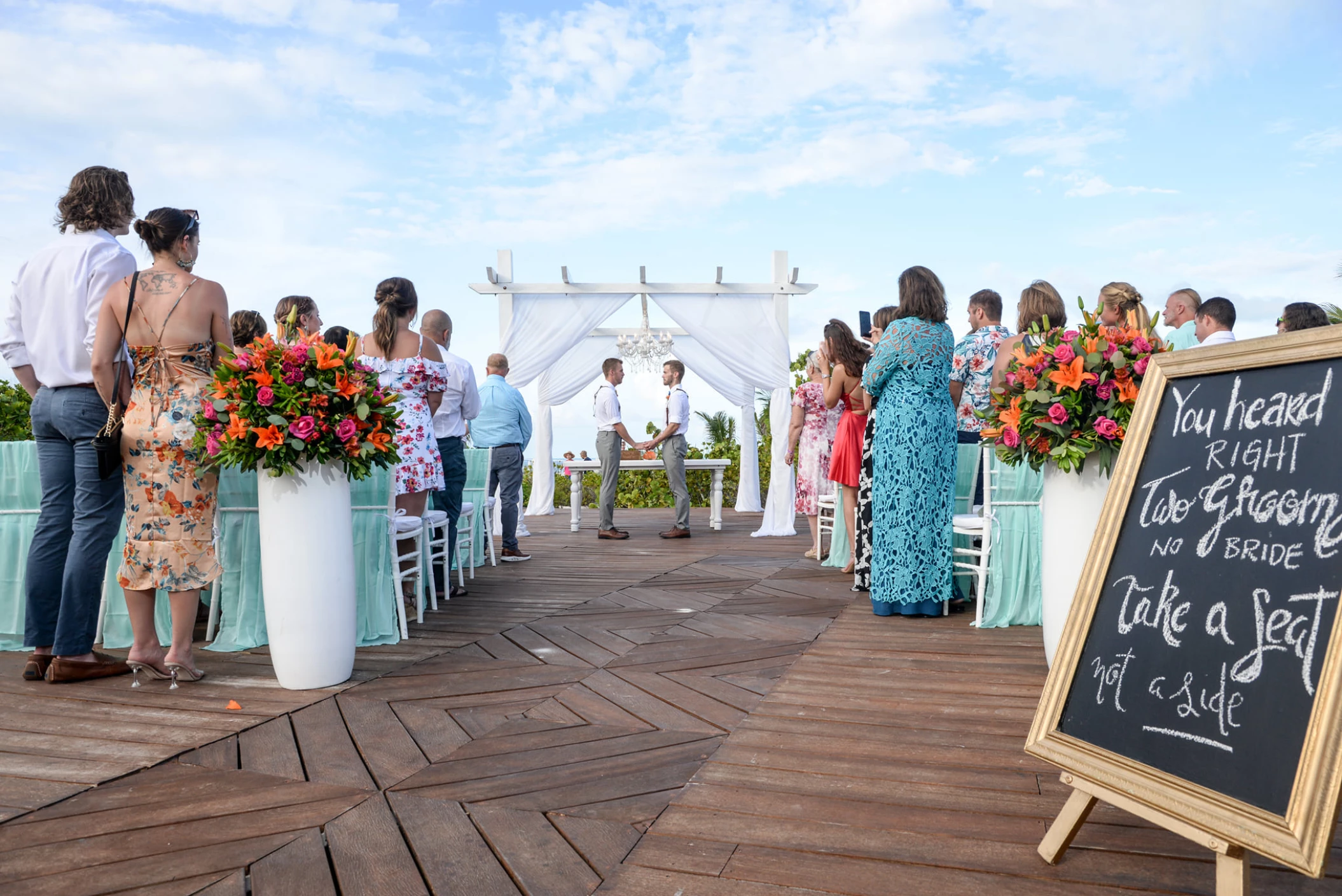 Ceremony decor on the beach deck at Grand Palladium Costa Mujeres