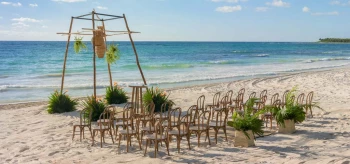 Ceremony decor on the beach wedding venue at Unico 20 87 Hotel Riviera Maya