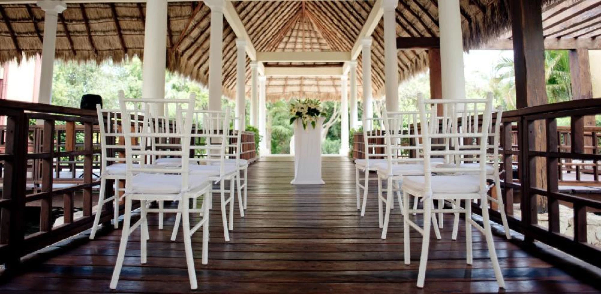 Ceremony decor on the bridge wedding venue at Valentin Imperial Riviera Maya