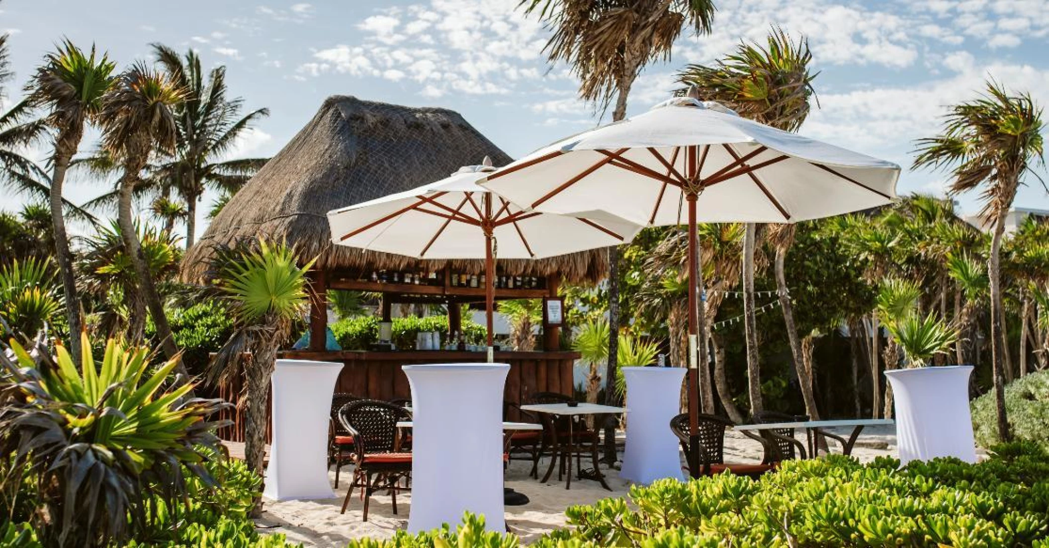 Cocktail party on susnset beach bar at Valentin Imperial Riviera Maya