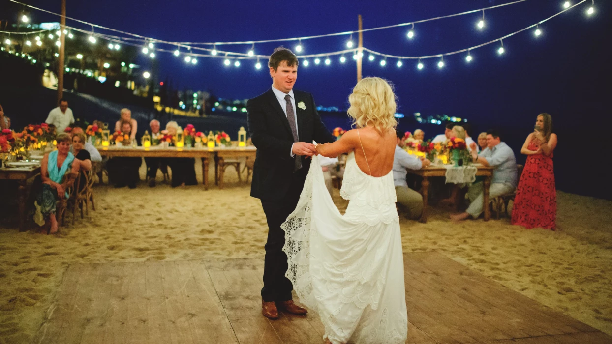 Couple dancing on the beach wedding venue at Villa La Estancia Los Cabos