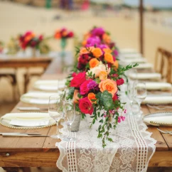 Dinner reception decor on the beach wedding venue at Villa La Estancia Los Cabos