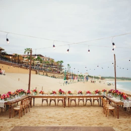 Dinner reception decor on the beach wedding venue at Villa La Estancia Los Cabos