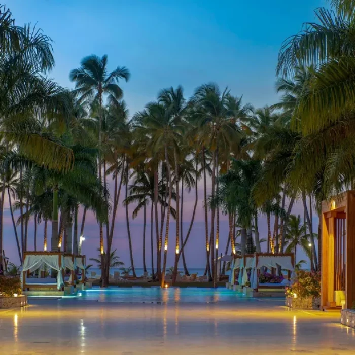 Night shot of the pool at Viva Wyndham V Samaná