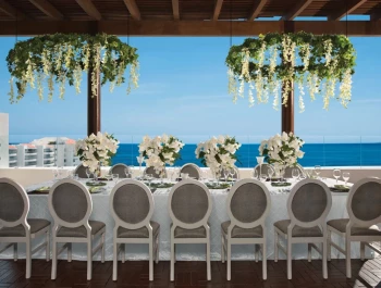 Wedding dinner setup on terrace at Wyndham Alltra Riviera Nayarit