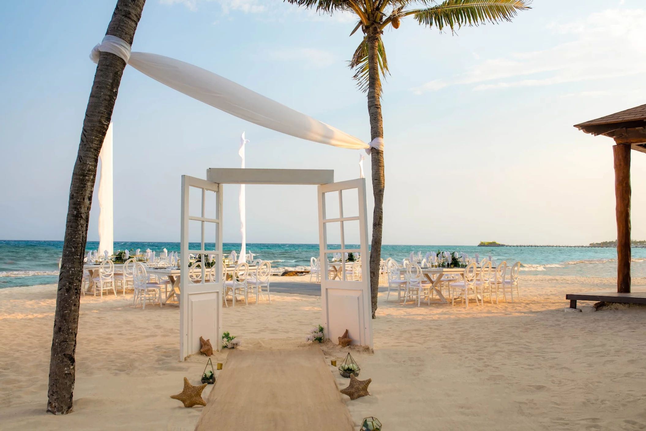 Beach wedding reception set up at Wyndham Alltra Playa del Carmen