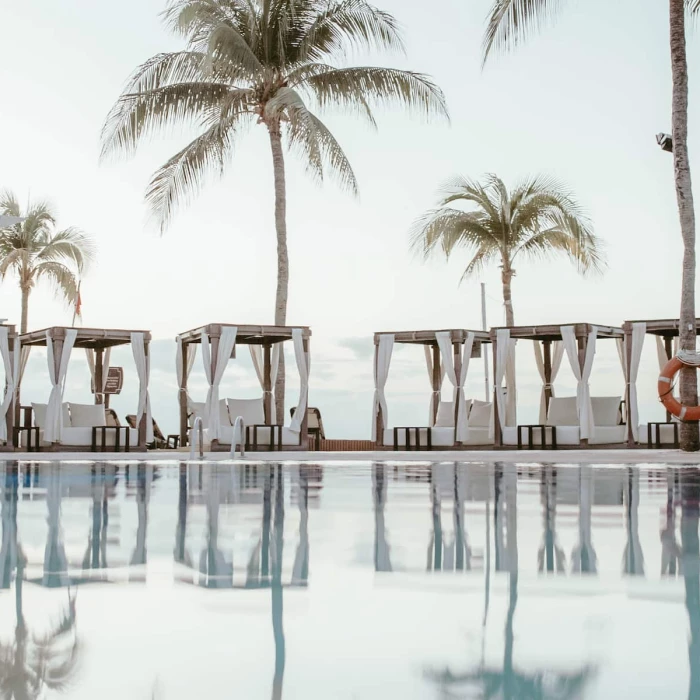 Pool and sun lounges at Wyndham Alltra Playa del Carmen