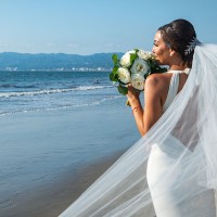 Bride on the beach at Wyndham Alltra Riviera Nayarit.