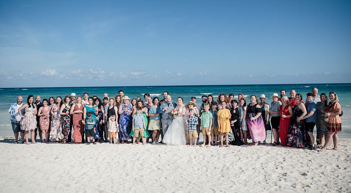 wedding group photo at the beach